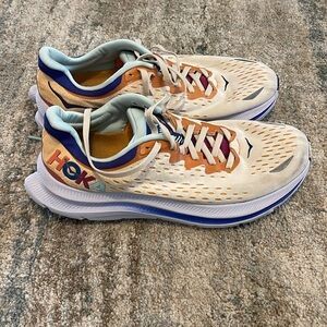 Hoka Cream and Orange Athletic Shoes with Modern Cushioning